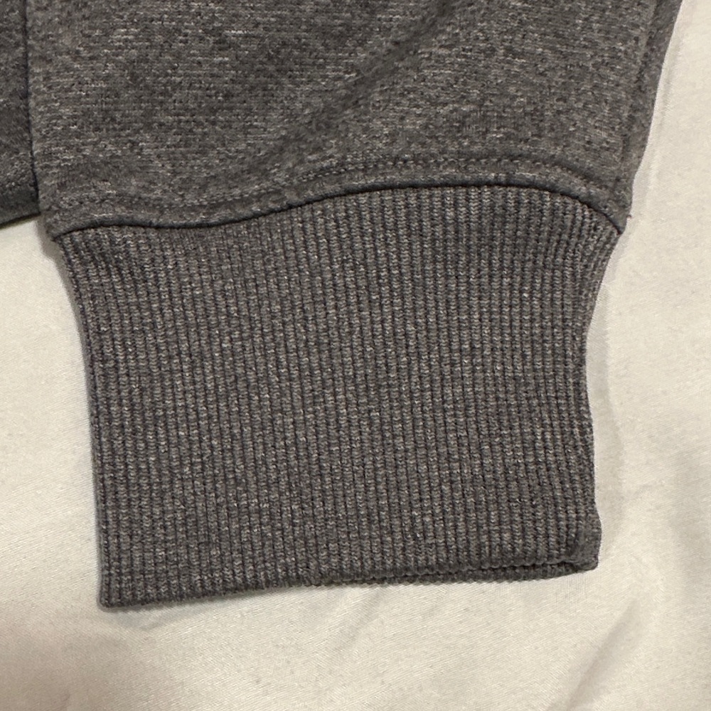 Under Armour Storm Semi Fitted Charcoal Gray Hoodie with Blue and Yellow logo. - Picture 4 of 7